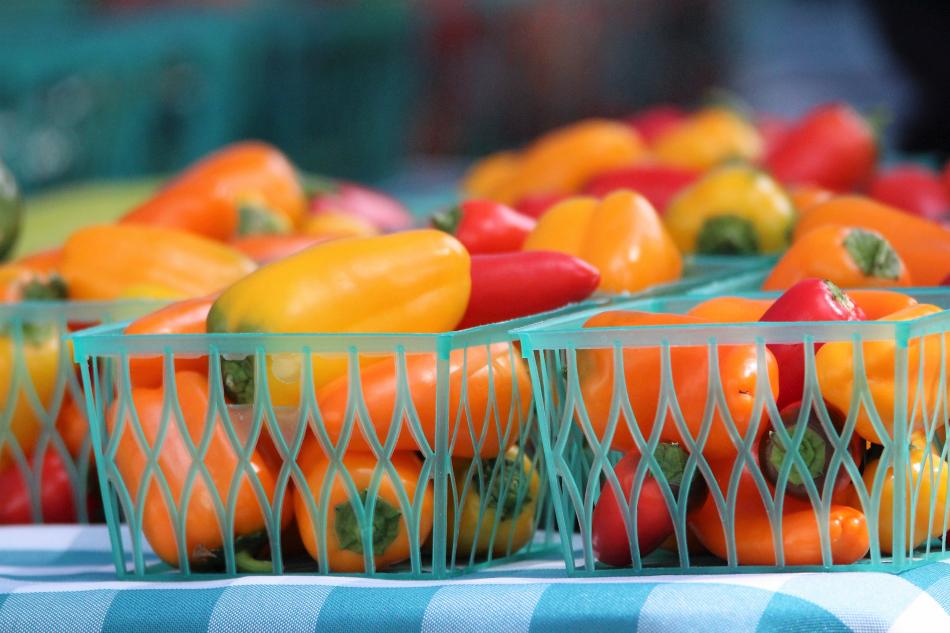 Baskets full of peppers.