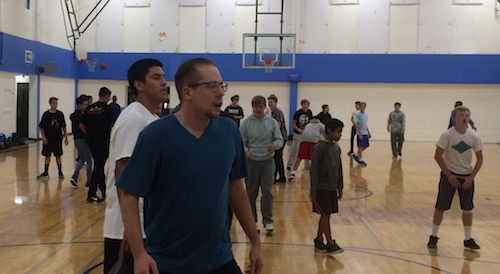 CHS teacher Robben Williams choosing to play basketball at lunch in the Small Gym.