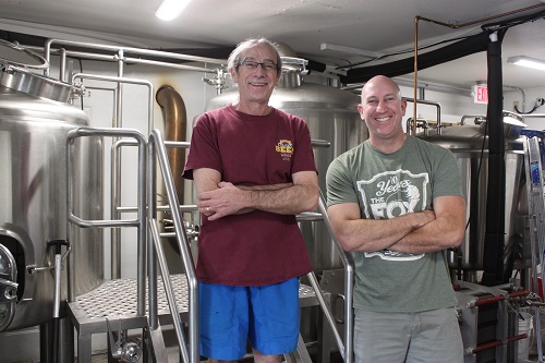 Inside the Fox Brewpub brewery with Tim Mason, new brew master, and Jim Phalan, owner.