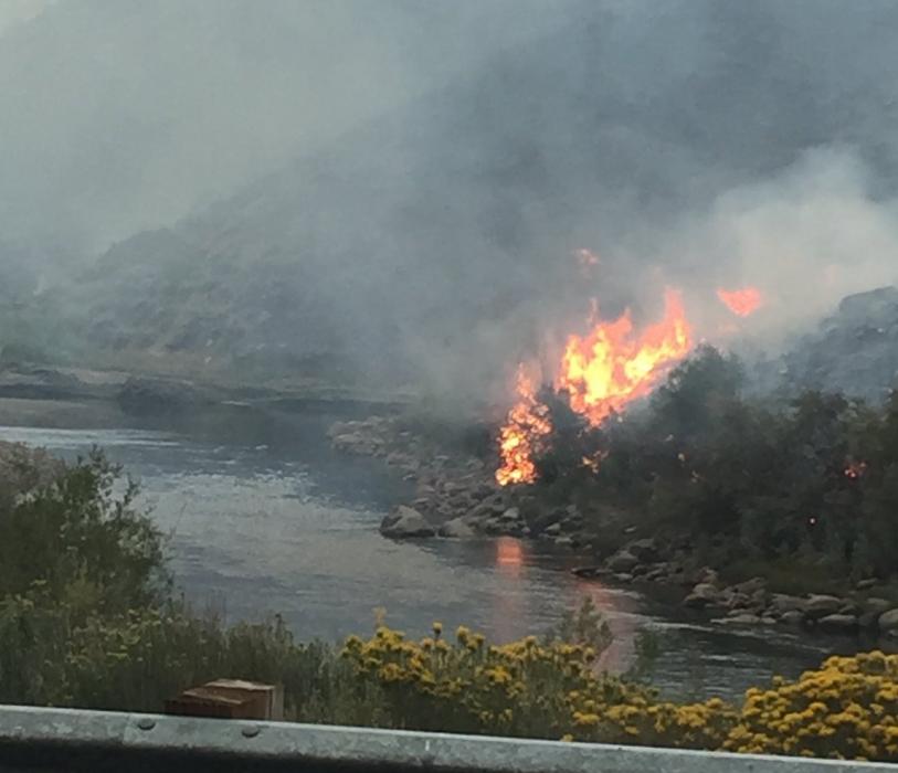 Highway 395 is closed with detours at Holbrook Junction, Nevada State Route 208. Caltrans photo of the fire area.
