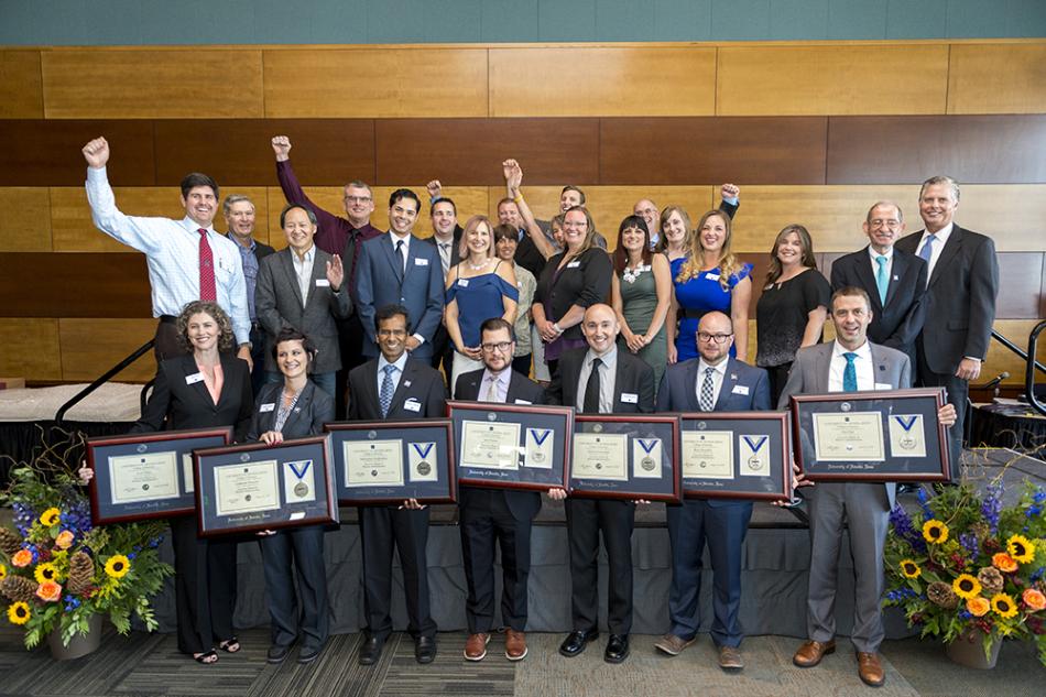 Students from the 2018 Online Executive MBA cohort celebrate their commencement.