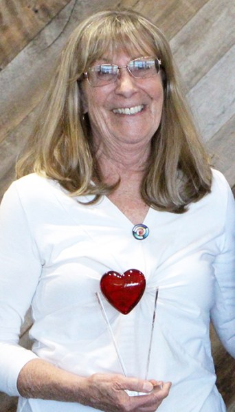 Chris Longley with the Claire Bauer Heart of a Volunteer Award