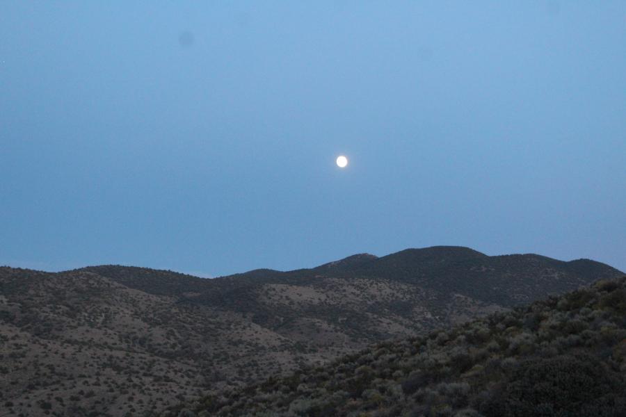 Full moon over the Pine Nut Mountain range.