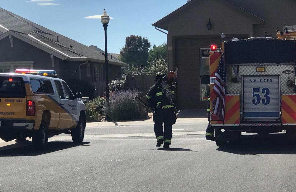 The garage fire was knocked down minutes after firefighters arrived. Photo by Kelsey Penrose
