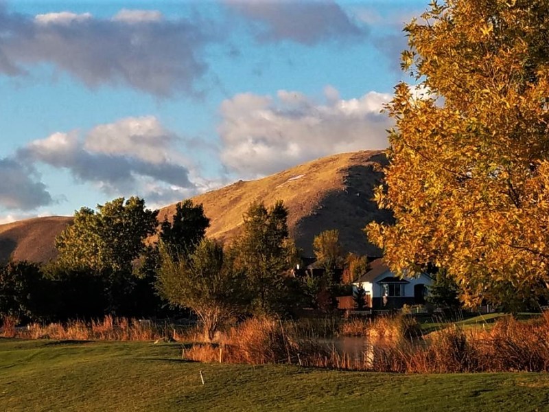 Photos by Brett Fisher. Sunrise on Silver Oak Golf Course with C Hill in the background.