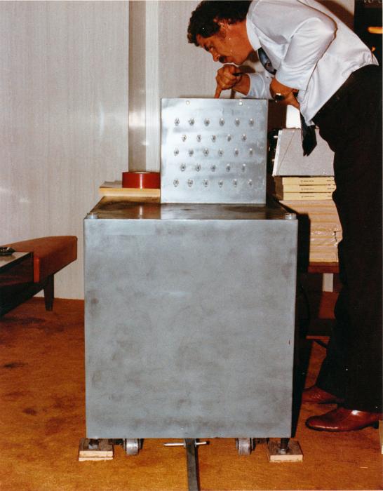 Fire Chief Thomas J. Huddleston inspects the bomb; photo by the FBI