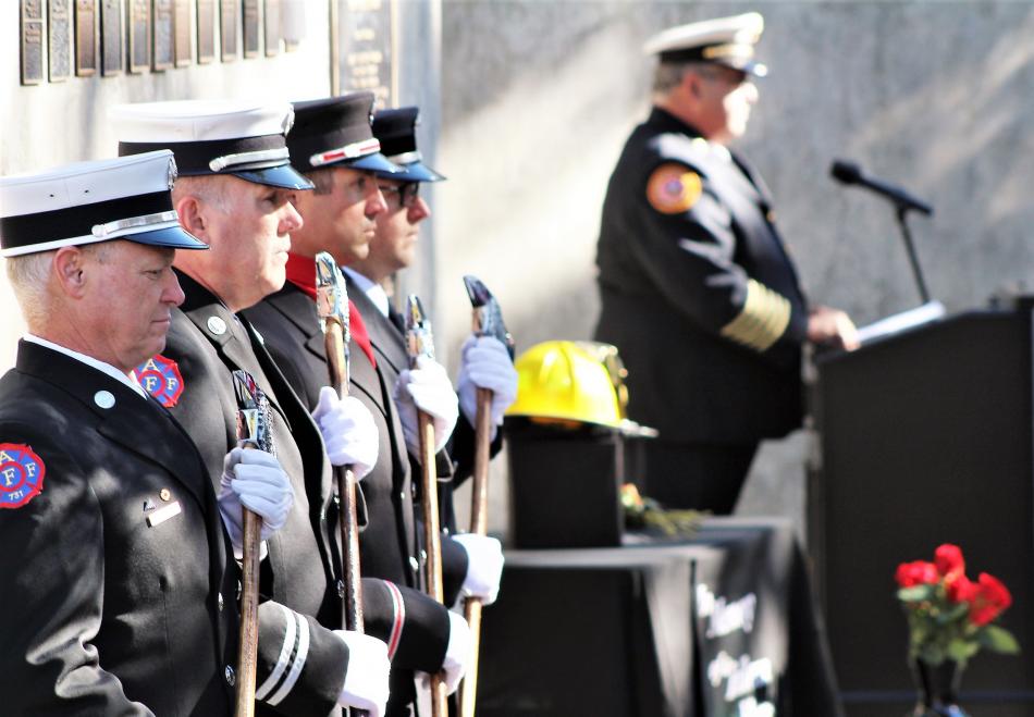 The Pledge of Allegiance is said during the opening of the memorial ceremony.