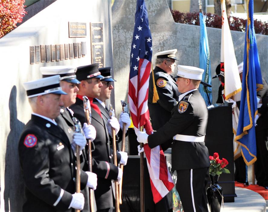 Flag colors are set on display during Saturday's memorial ceremony.