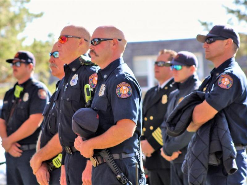 Photos by Brett Fisher. Carson City Firefighter-Paramedics listen to the chaplain's invocation Saturday.