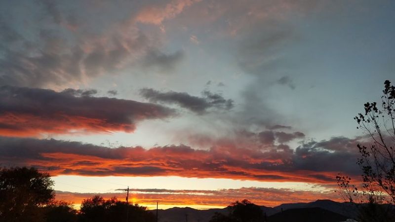 A fiery sunset Wednesday night makes way for day of sunshine ahead. Photo by Connie Corley