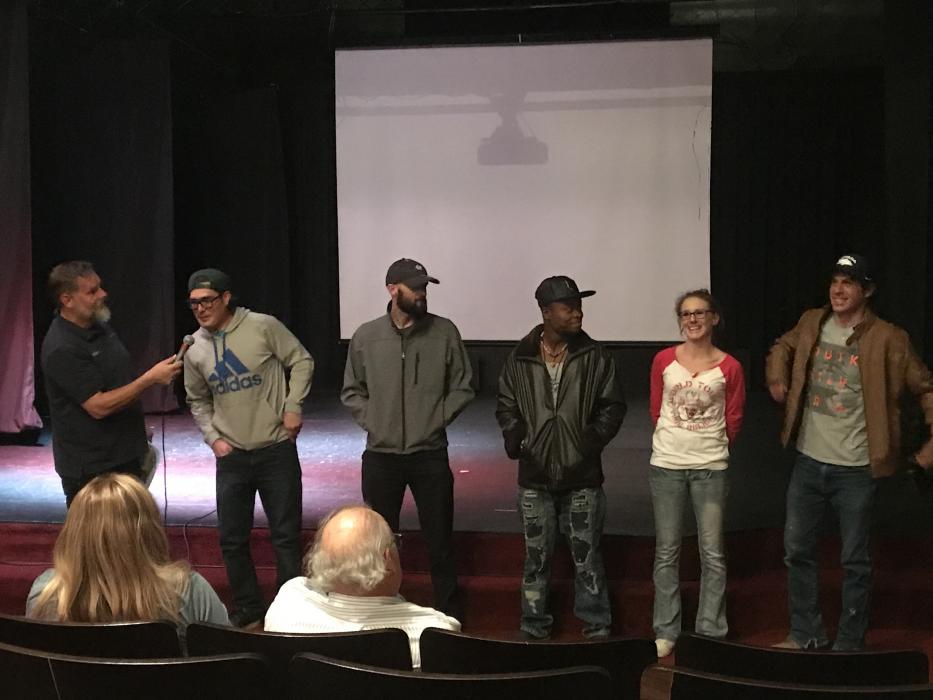 Wiencek and film maker Sean LeBard (second from right) discuss 'Pumpkin Monster' with cast