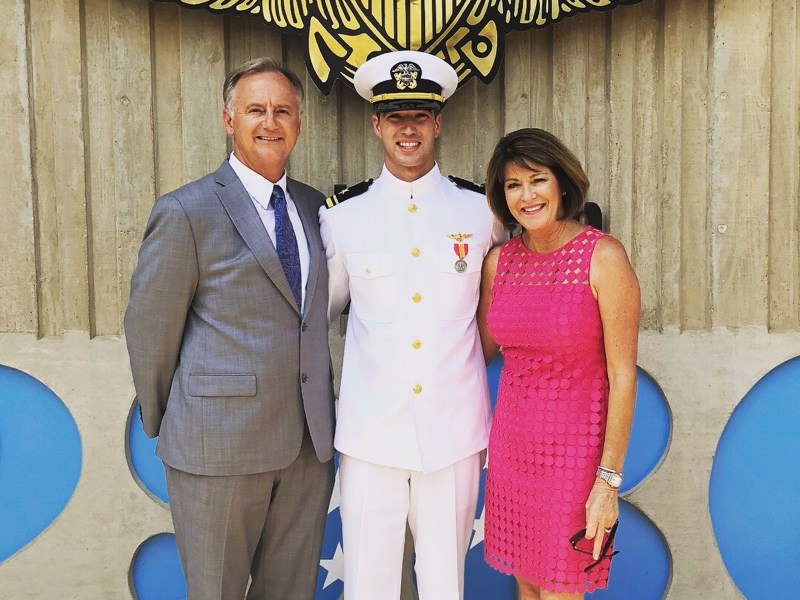 Sierra Lutheran High School graduate Conner Love, center, pictured with parents John and Karin, at his Winging Ceremony