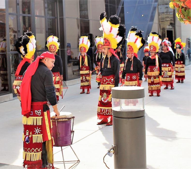 A drummer keeps the beat for the Aztec dancers Saturday.