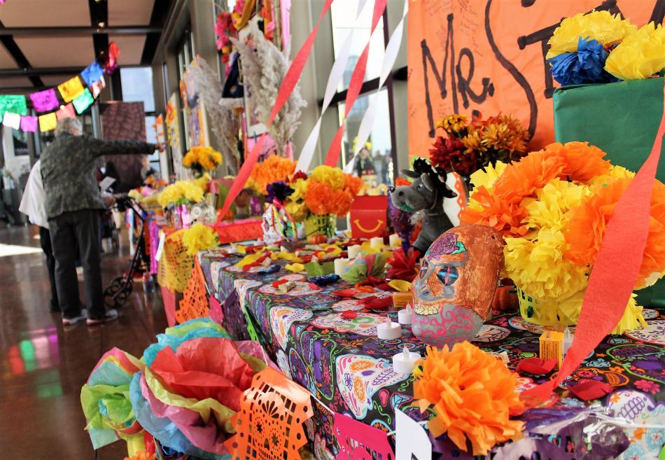 Altars display memories of loved ones inside the Nevada State Museum Dema Guinn Concourse.