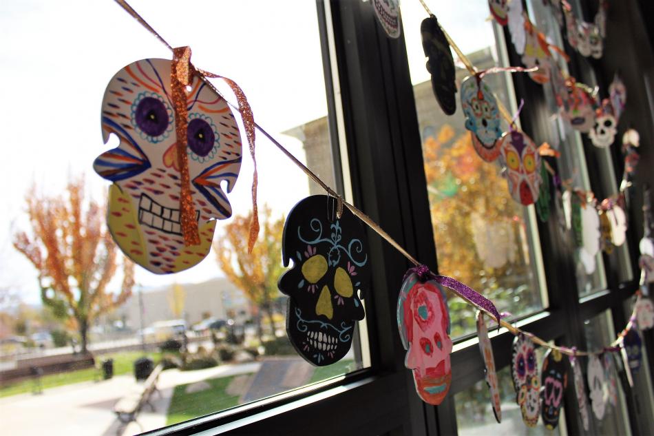 Skull decorations are hung inside the Nevada State Museum Dema Guinn Concourse.