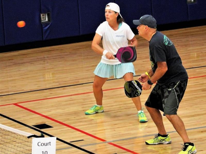 Photos by Brett Fisher. Pickleball doubles teams compete in a tournament at the MAC Saturday.