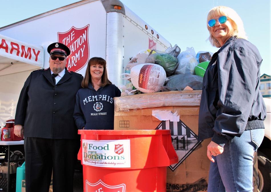 Photos by Brett Fisher. Salvation Army Capt. Mark Cyr with Carson City Kiwanis volunteers Sheryl Knight and Martha Cherney.