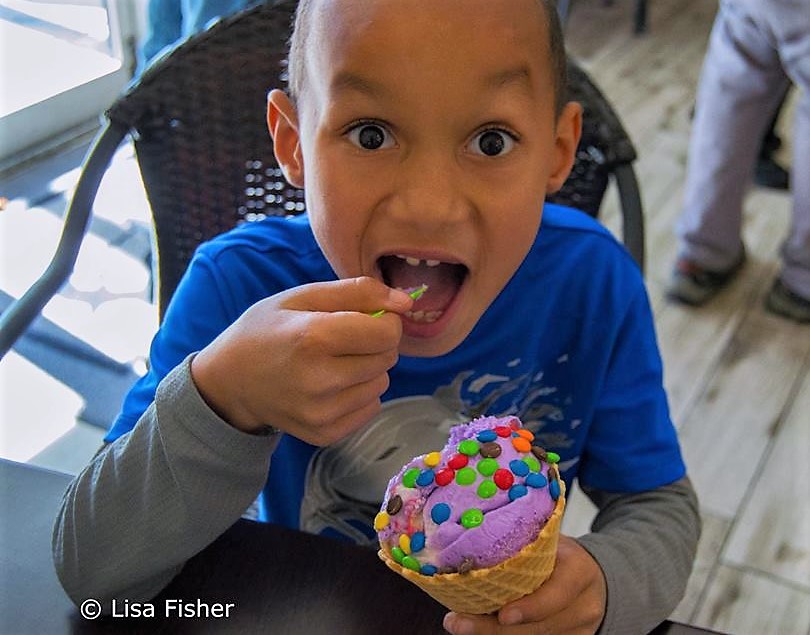 Photo by Lisa Fisher. Isaiah Sebring-Smith, 7, of Carson City enjoys a treat at Scoup's Ice Cream and Soup Bar.