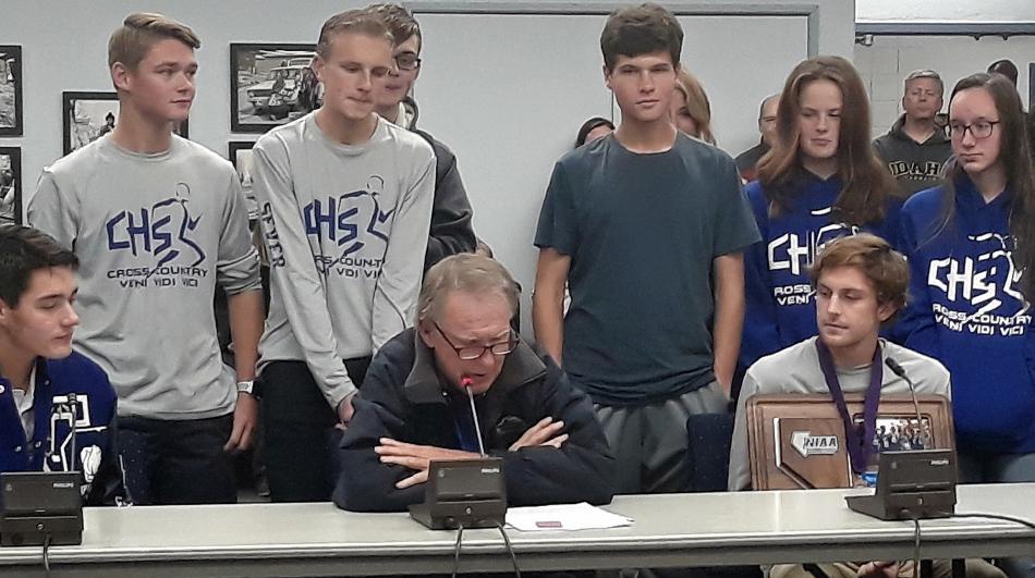 CHS Cross Country team members and Coach Peter Sinnott.