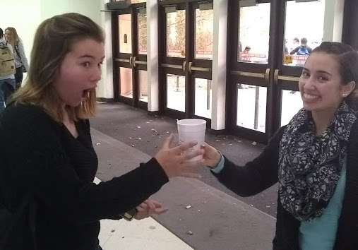 CHS FCA giving hot chocolate to students.