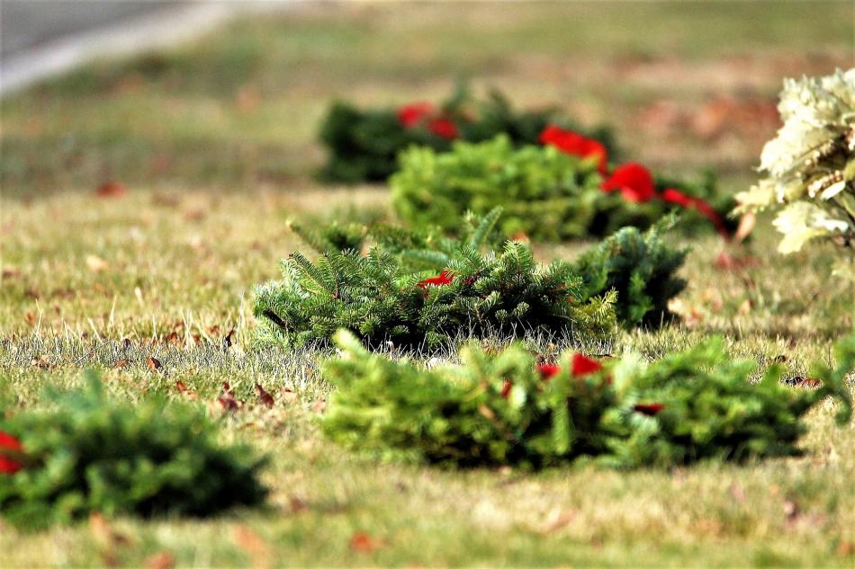 Photo by Brett Fisher. Christmas wreaths are laid at the graves of veterans and fallen military at Lone Mountain Cemetery.