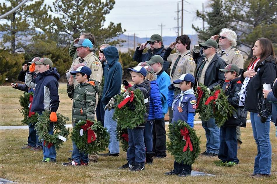 A mix of veterans and civilians pay tribute to the fallen Saturday.