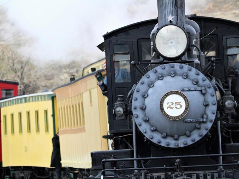 Photo by Brett Fisher. Engineer of the V&T Engine No. 25 "Santa Train" waves to onlookers at the Nevada State Railroad Museum.