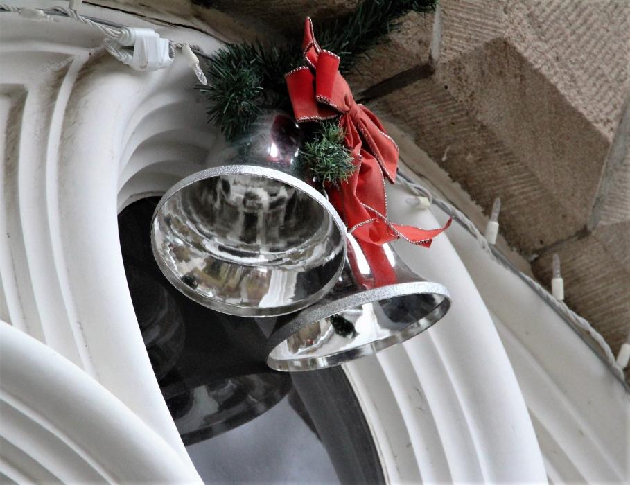Silver bells dress a second story window of the State Capitol.