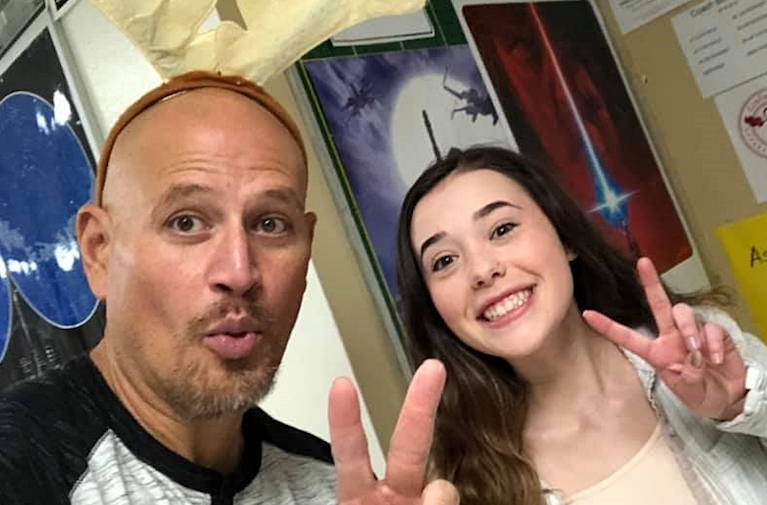 CHS graduate Hannah Golik visits former teacher Jim Bean to tell him she finished her first semester at UNR.