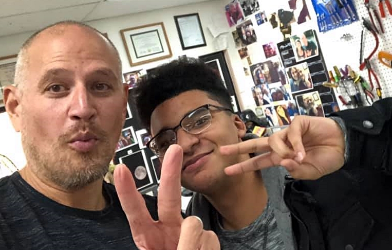 CHS graduate Xavier Brown, visiting former teacher Jim Bean, shares his completion of his first semester at UNR.