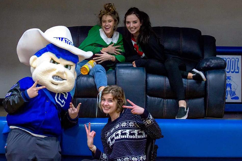 CHS students enjoying the Seat of the House at the latest basketball game - Photo by Melissa Faith Knight of Faith Photography