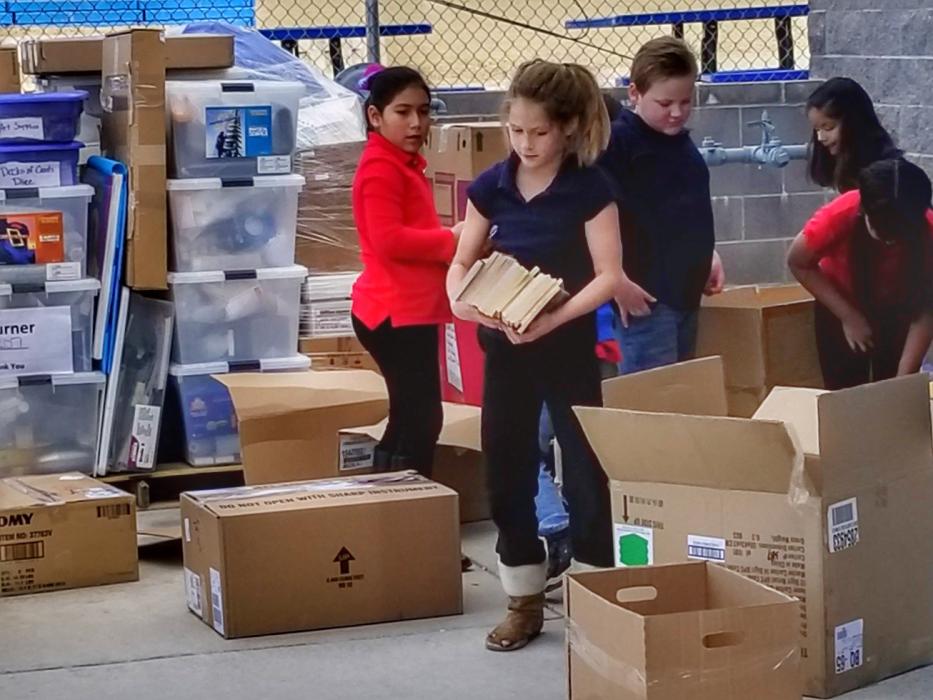Empire Elementary students help load 7 pallets of school supplies bound for Paradise, Calif.