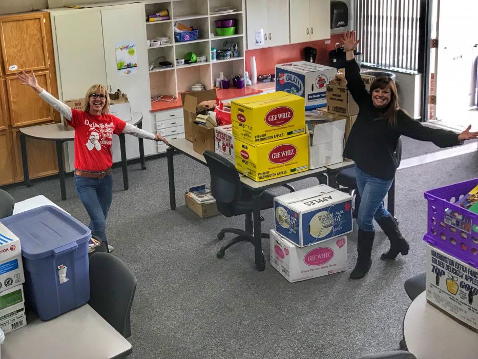 Joanna Kaiser and Jana Raab - 3rd grade teacher at Fritsch display more than 10,000 books for Paradise, Calif.