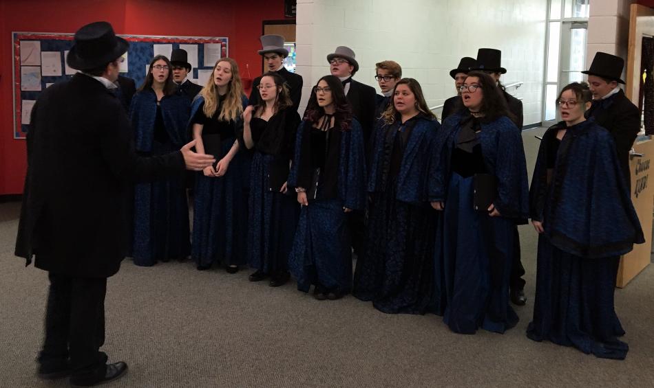 CHS Chamber Choir caroling at CCSD elementary schools.