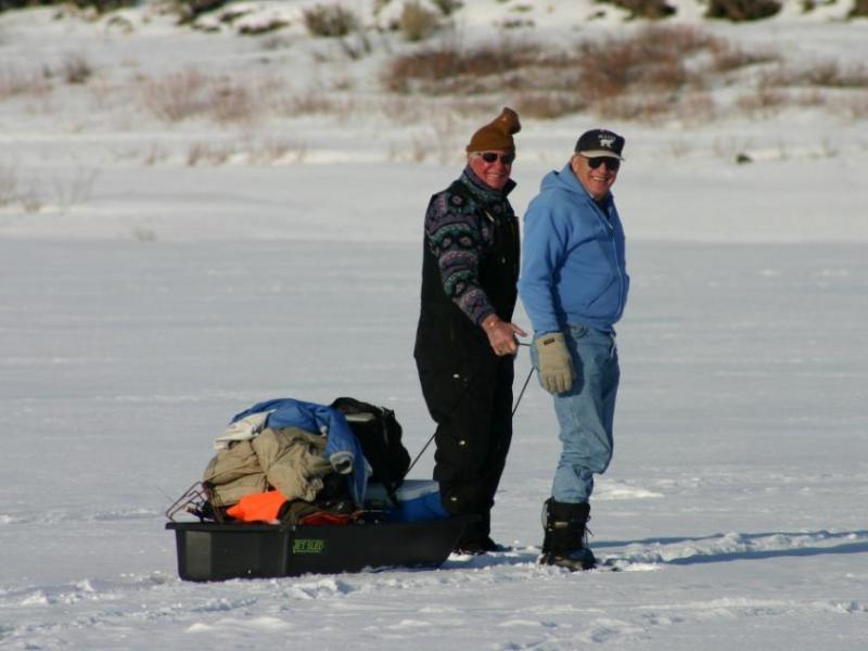 Don Hettrick and Don Quilici prepare to ice fish in this file photo by Mark Day.