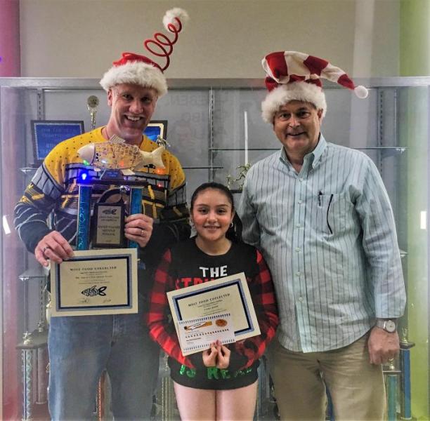 Eagle Valley Middle School Principal Lee Conley (left) with seventh-grader Vielka Lopez Munguia and Jim Peckham of FISH.