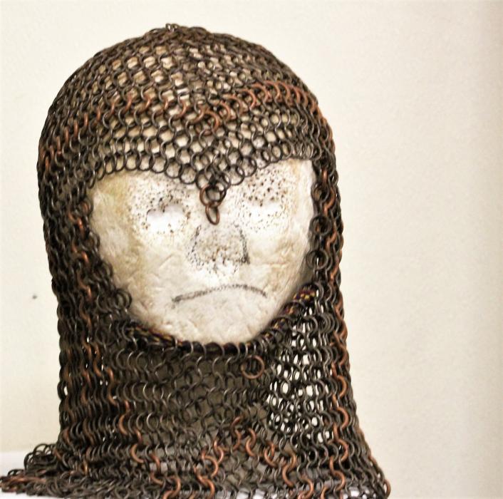 A medieval-looking chain mail hood.