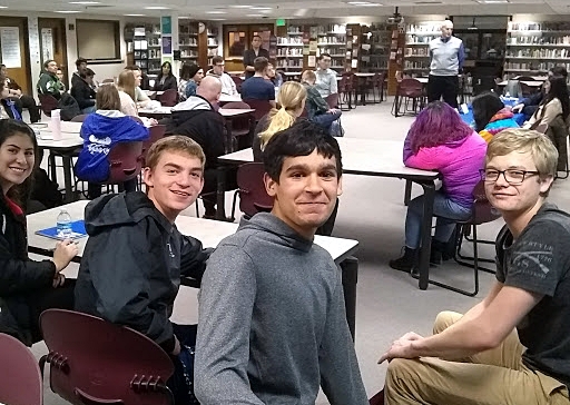 CHS juniors listening to CHS alumni talk about their first year of college at UNR.