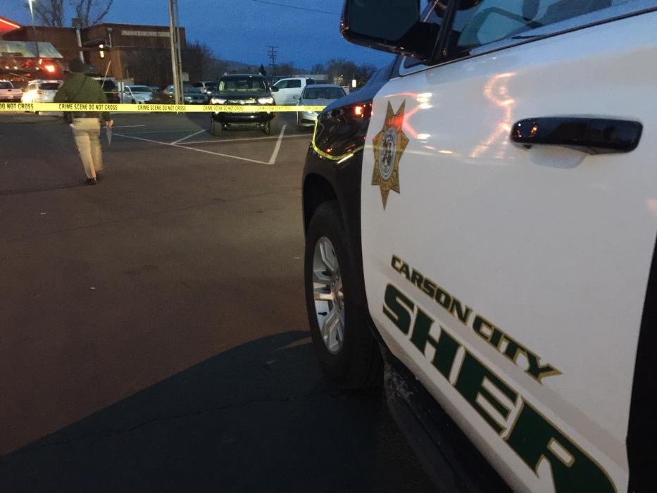 There was a law enforcement presence Saturday afternoon at a South Carson Street parking lot. Photo by Jeff Munson