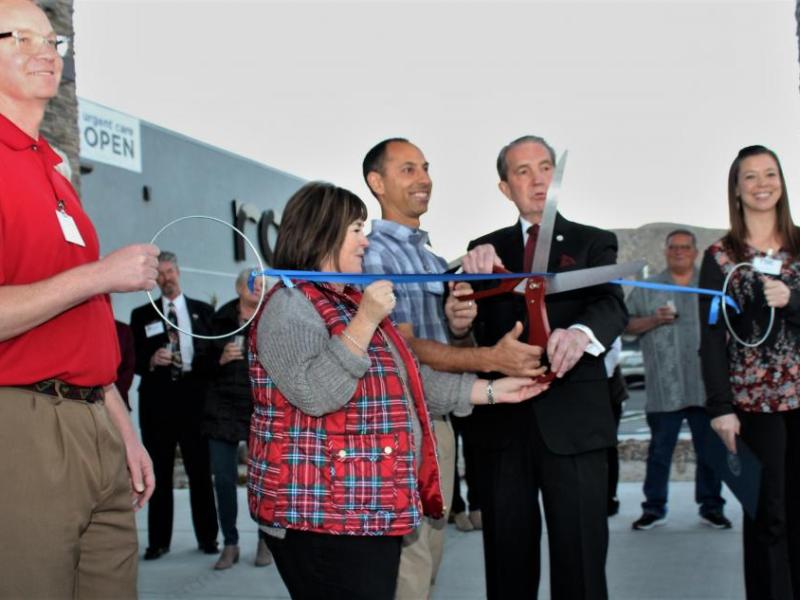 Photos by Brett Fisher. Dr. Renny Uppal, Lori Bagwell and Carson City Mayor Bob Crowell cut the ribbon Thursday evening.