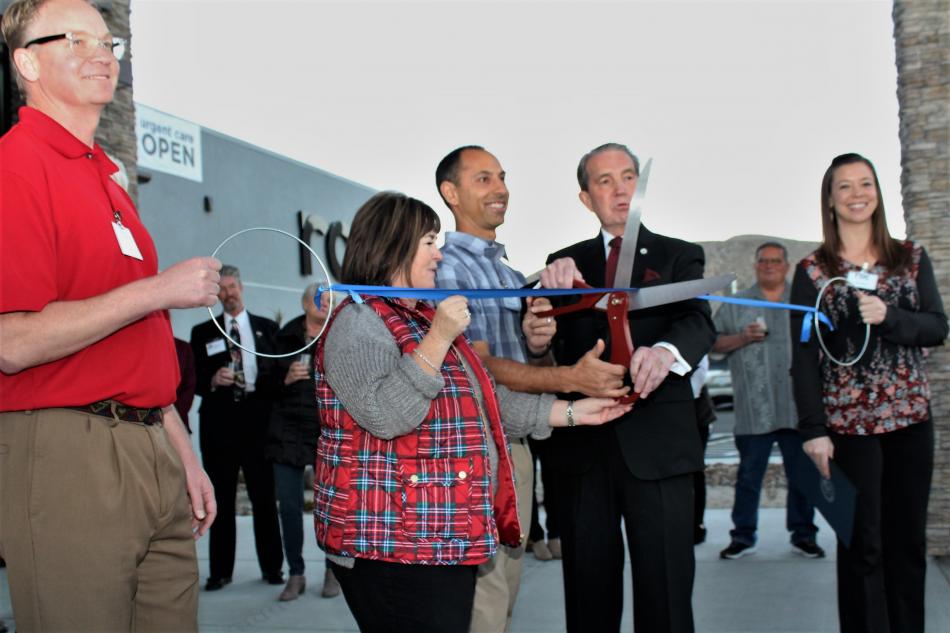Photos by Brett Fisher. Dr. Renny Uppal, Lori Bagwell and Carson City Mayor Bob Crowell cut the ribbon Thursday evening.