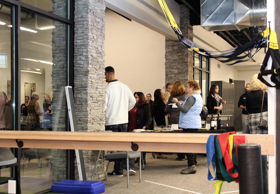 Thursday's open house is reflected from a mirror in the physical therapy center.