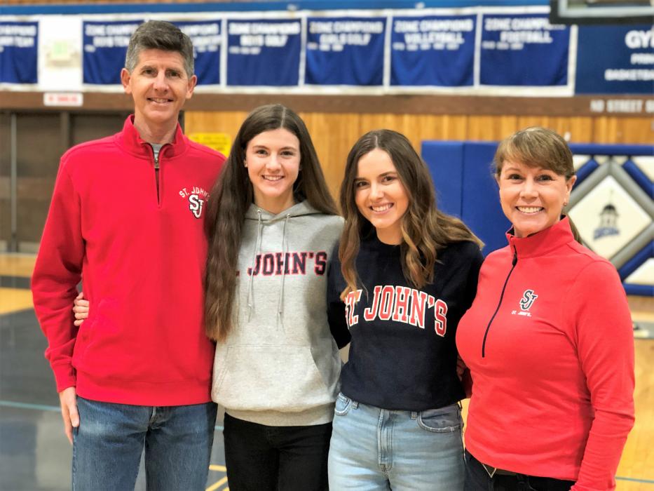 Jill Beglin (third from left) with father Frank Beglin (left), younger Sister Karen Beglin, and mother Emily Beglin.