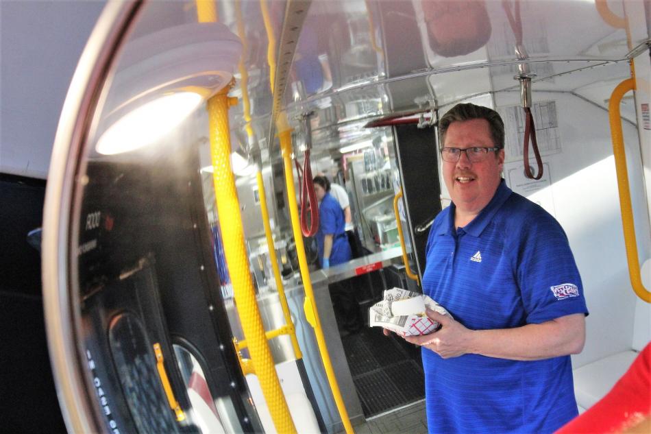 Owner Billy Lavelle inside The Bus Boy Mobile Cuisine.
