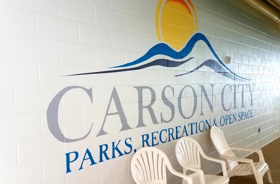 Carson City Parks, Recreation and Open Space mural logo in the therapy pool area.