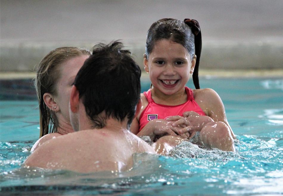 Photos by Brett Fisher. Families enjoyed swimming in the updated 50-meter pool Saturday inside the Carson Aquatic Facility.