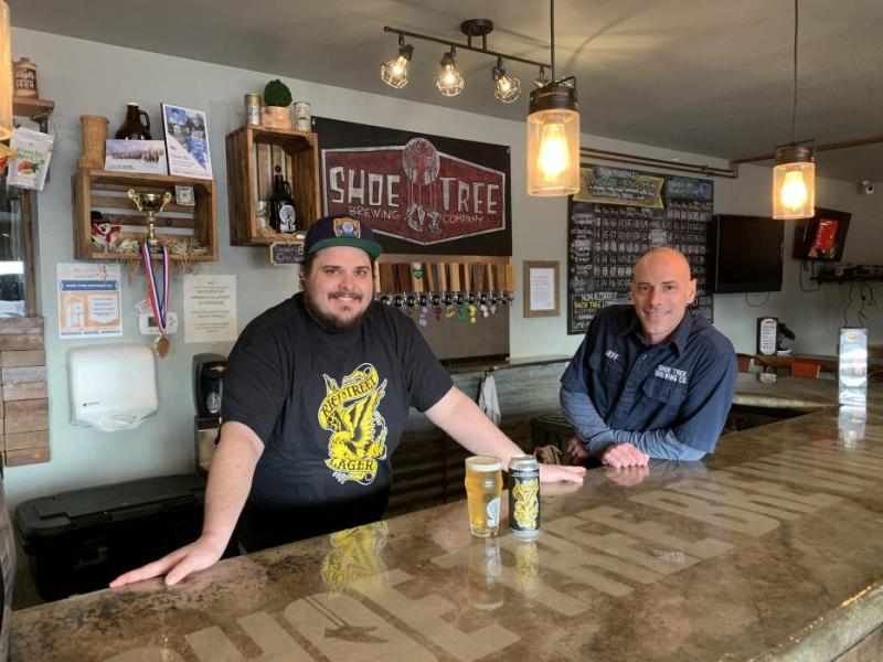 Owners and brothers Paul and Jeff Young with the new Rice Street Lager