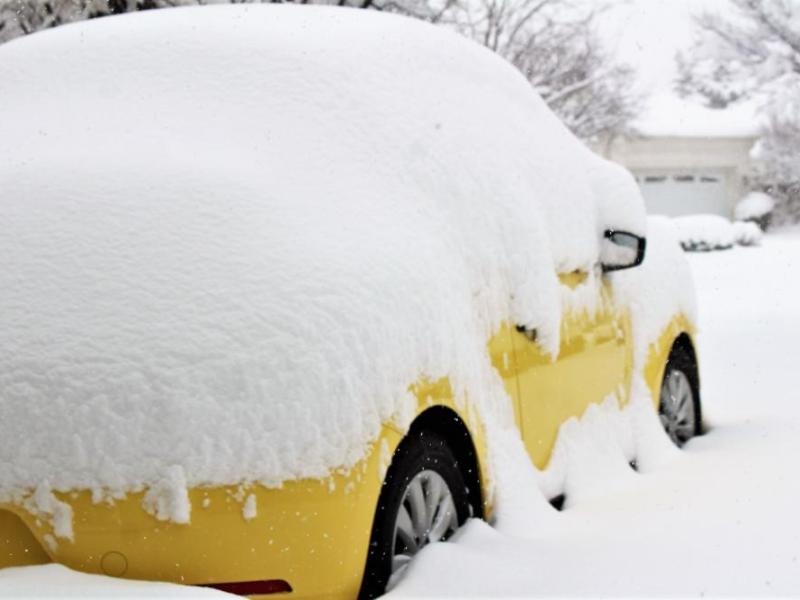 Photos by Brett Fisher. A Volkswagen Beetle is virtually buried in 13 inches of snow Tuesday morning in Northwest Carson City.