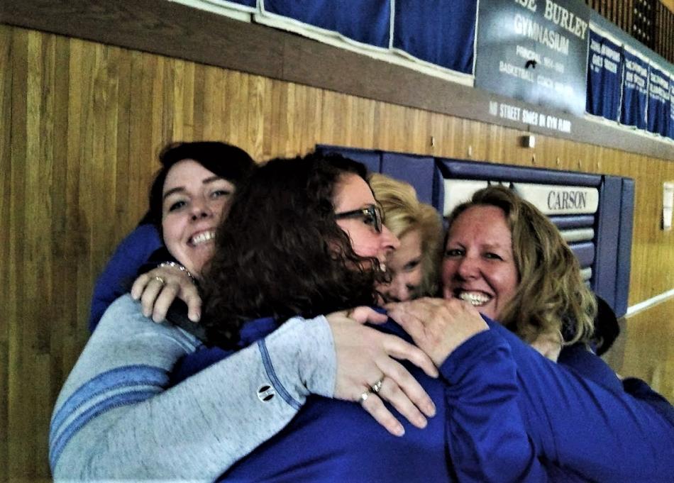 CHS teachers giving one another an 8-second hug, per keynote speaker Collin Kartchner.