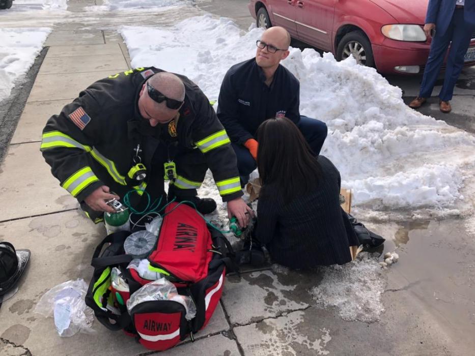 Firefighters work to revive a dog located at the St. Charles Hotel. The dog was taken to a local vet. Photo by CCFD.